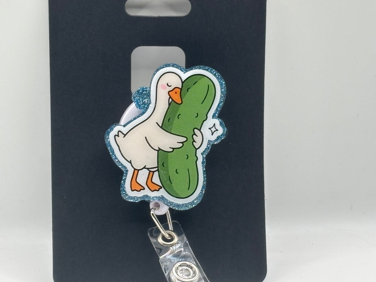 Silly Goose Pickle Hug – Glitter Badge Reel