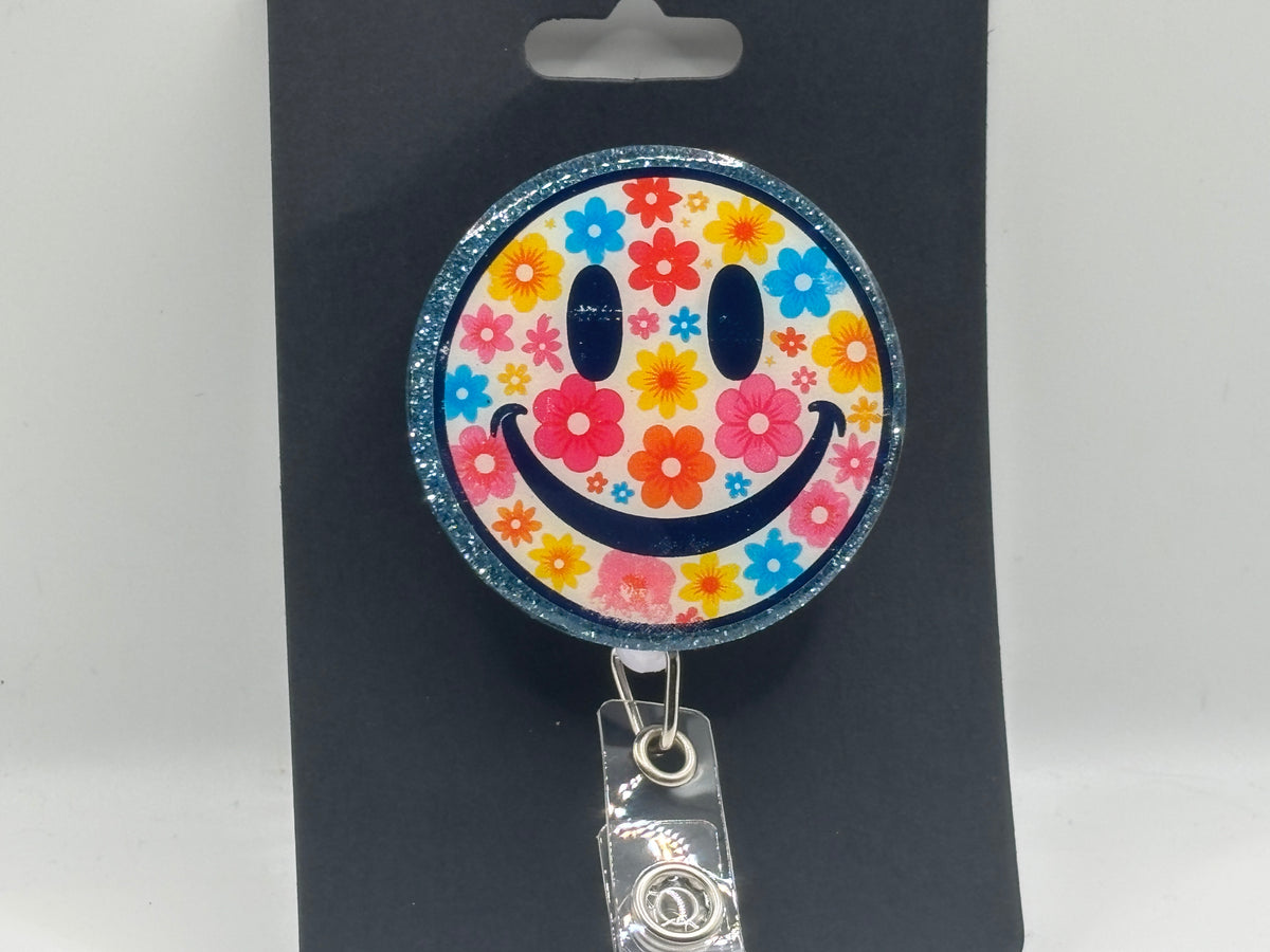 Flower Power Smiley Face – Glitter Badge Reel