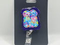 Colorful Dalmatian Puppies – Purple Glitter Badge Reel